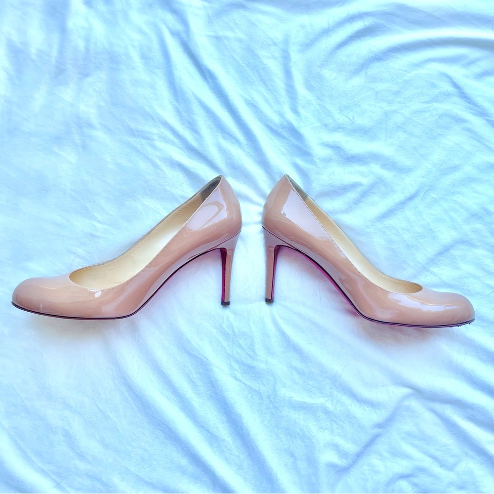 Christian Louboutin red sole pumps